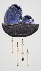 ceramic wall sculpture of boat under Tsunami wave with bones hanging below the boat