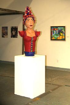 Ceramic sculpture od mountain deity wearing wedding hat "Immigration & Merging Culture Show"