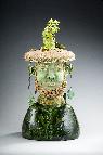 Ceramic sculpture of earth god with tree spirit on head